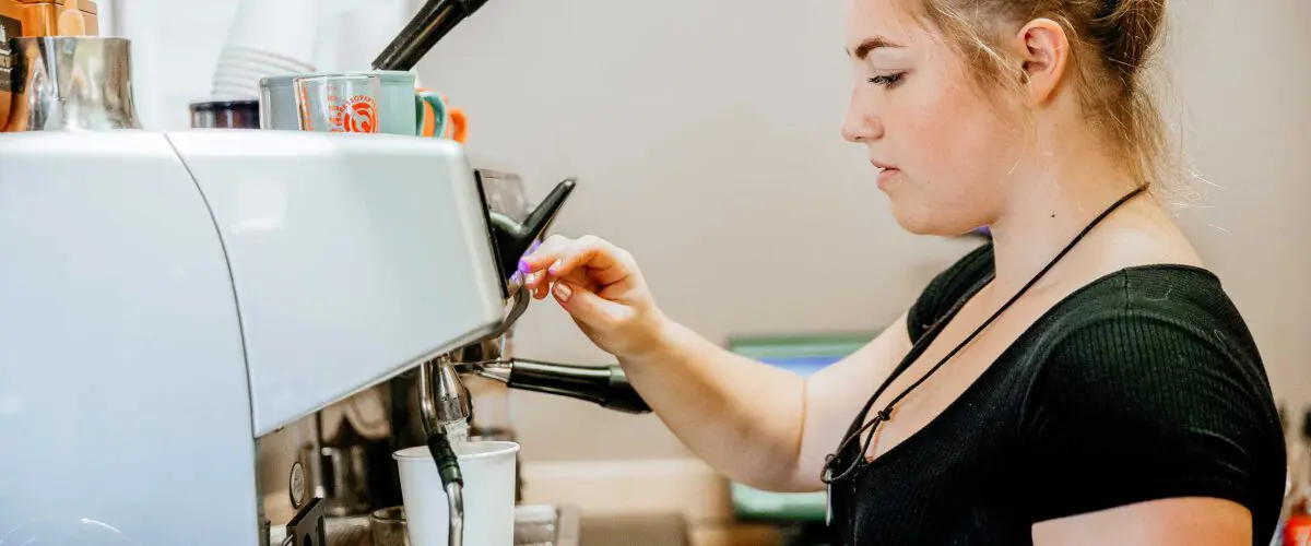 Barista making coffee